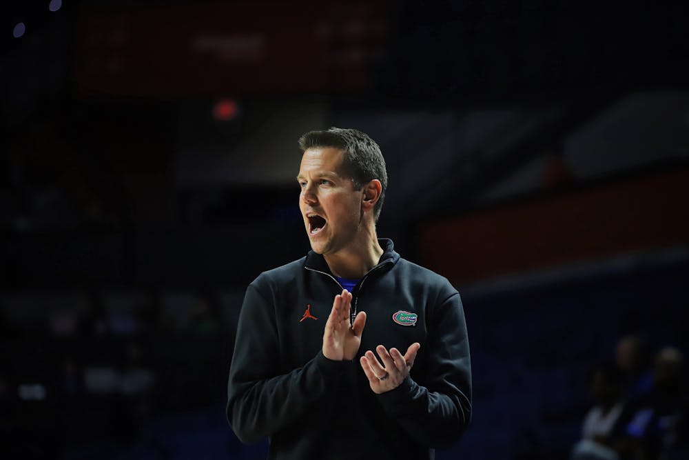 <p>Coach Cam Newbauer on the sidelines of the Gators' game versus Presbyterian last year. With Kinslow's commitment, Newbauer has brought three transfers to Gainesville this offseason.</p>