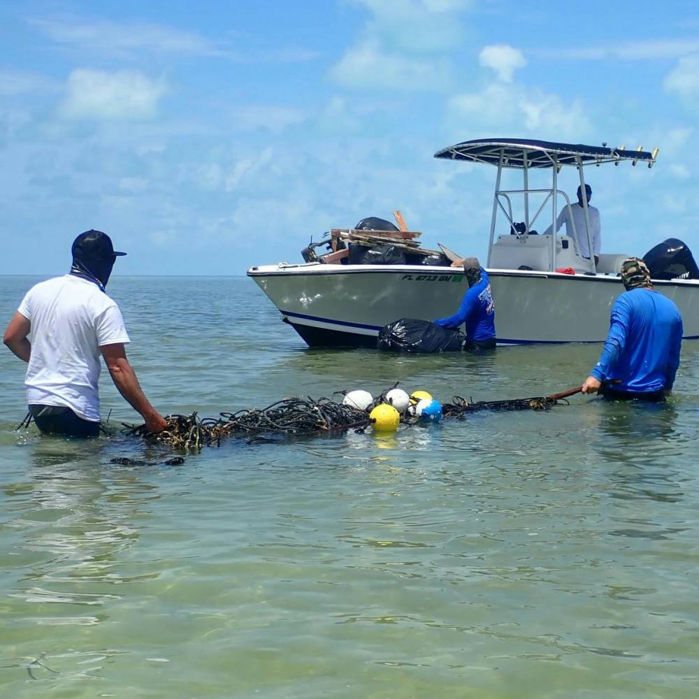 UF marine biologists and 30 local fisherman from the Florida Keys were part of a project that collected 26 tons of debris to improve sea turtle habitats.   