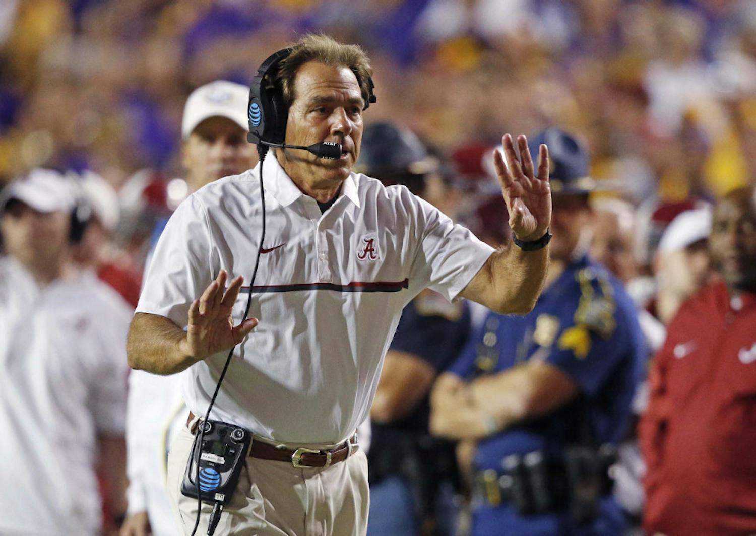 Alabama head coach Nick Saban tries to get the referee's attention as the play clock approaches zero in the second half of an NCAA college football game against LSU in Baton Rouge, La., Saturday, Nov. 5, 2016. Alabama won 10-0. (AP Photo/Gerald Herbert)