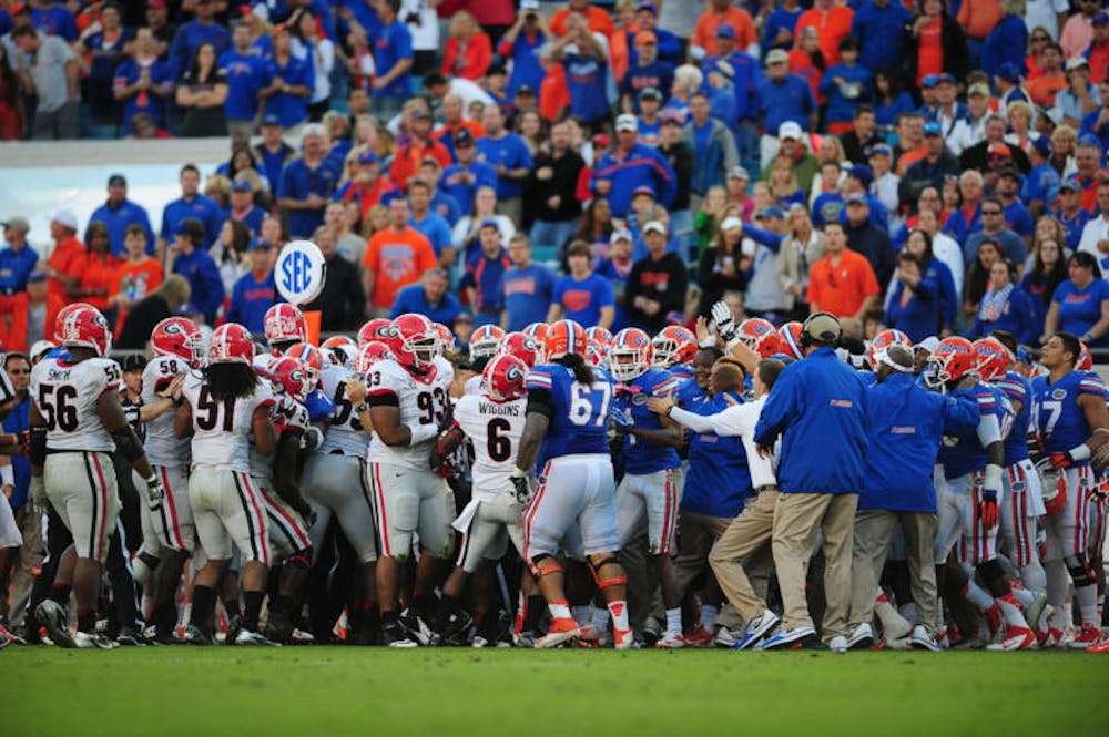 <p>Florida and Georgia players scuffle in this Alligator file photo from 2014.</p>