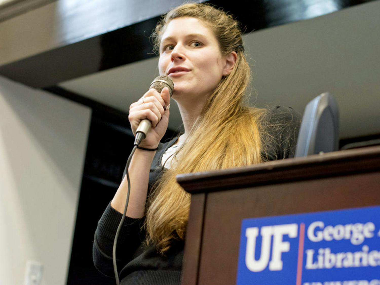 Filmmaker Jessica Oreck welcomes UF students to the screening and Q-and-A of "The Vanquishing of the Witch Baba Yaga" in the Isser and Rae Price Library of Judaica at UF on Tuesday.