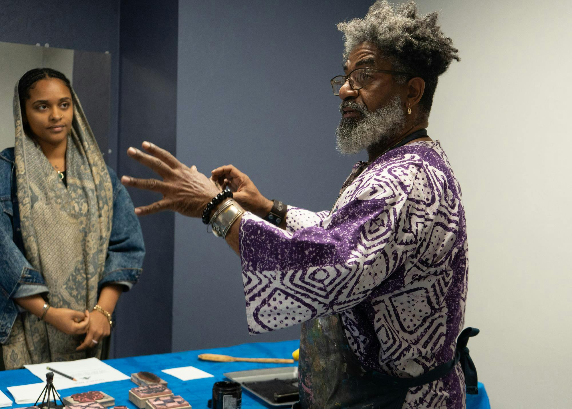 Turbado Marabou leads a print making workship at the Oakview Community Center for the Celebration of Black Love, Art, and Poetry event, Saturday, Feb. 7, 2026.