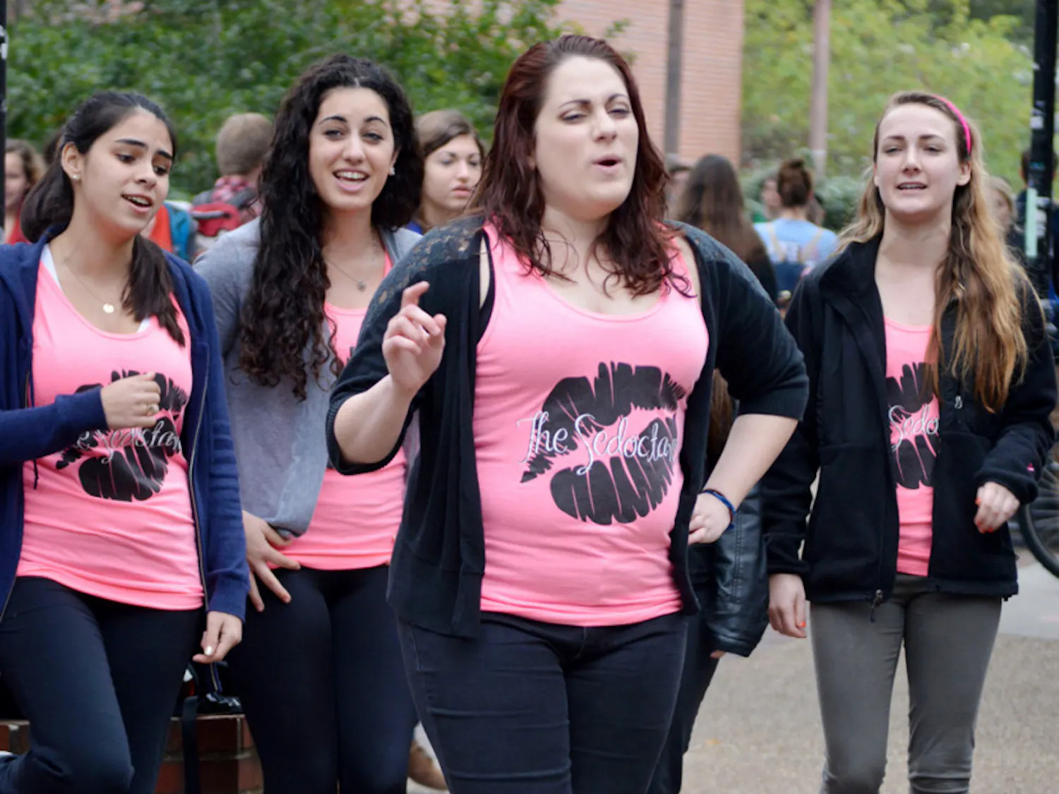 Kelsey Roessler, a 21-year-old UF accounting junior, performs Wednesday on Turlington Plaza with a capella group the Sedoctaves.