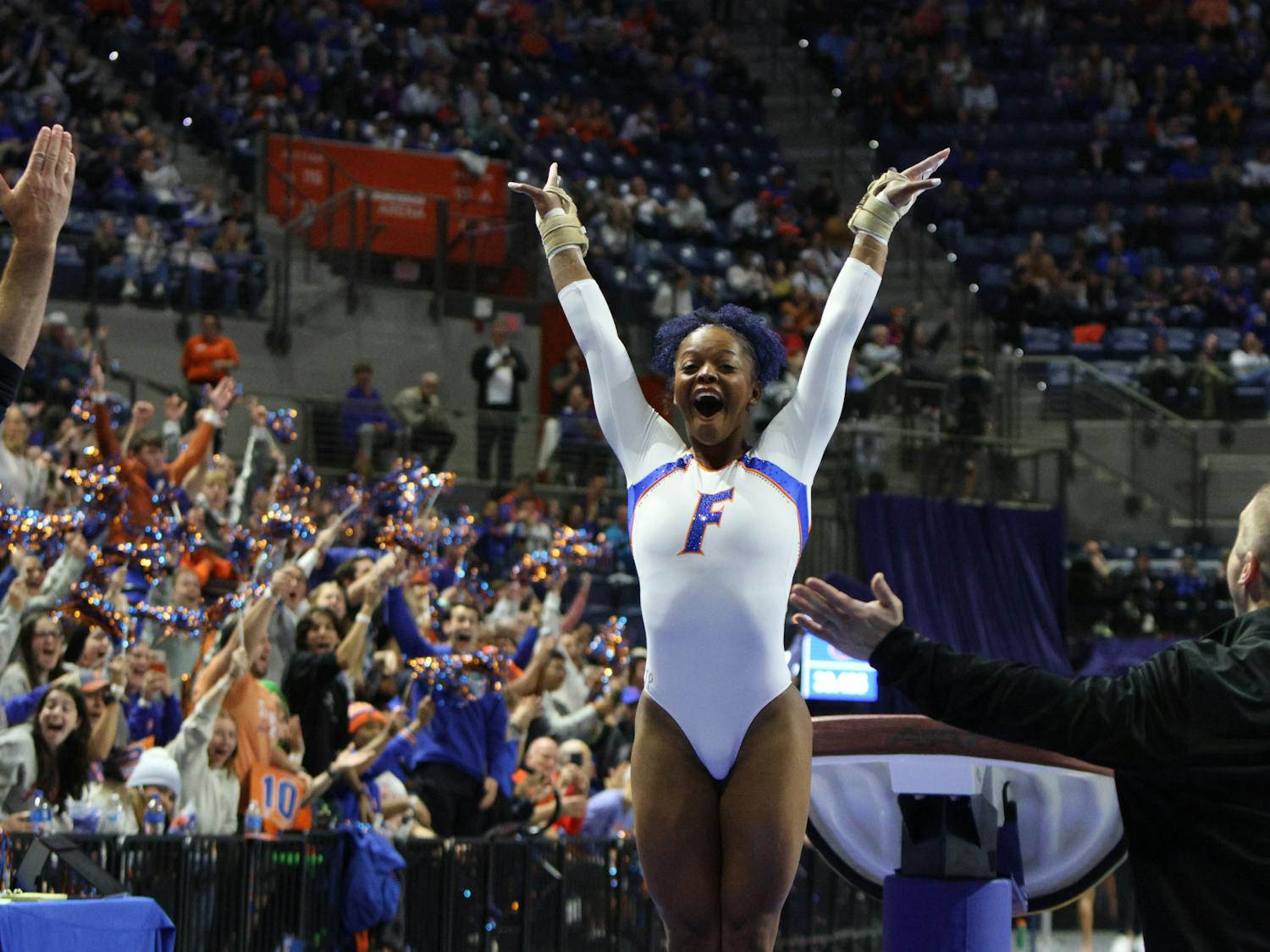 Florida gymnast Trinity Thomas celebrates after a perfect landing from her vault routine against the Georgia Bulldogs Friday, Jan. 27, 2023.
