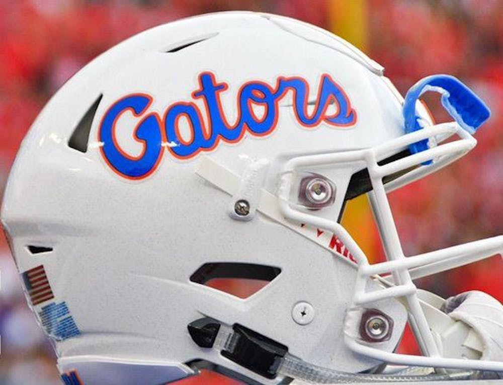 <p>Florida Gators alternate white football helmet.</p>