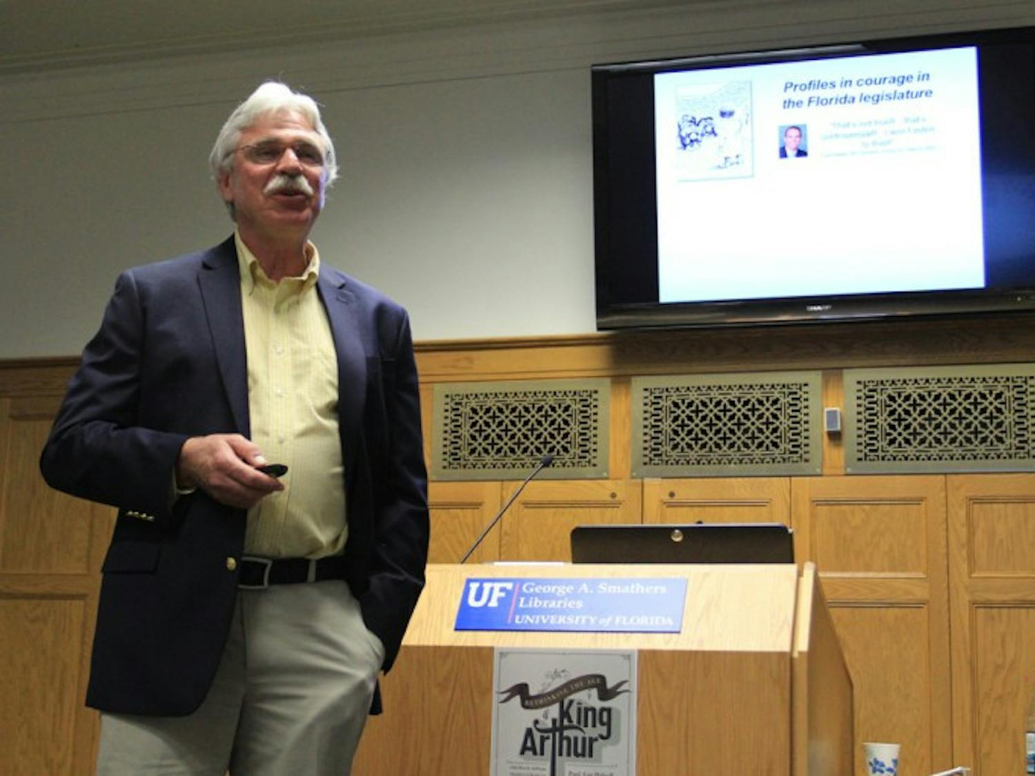 Former UF professor Stephen Mulkey speaks about climate change in the Smathers Library East on Tuesday night.