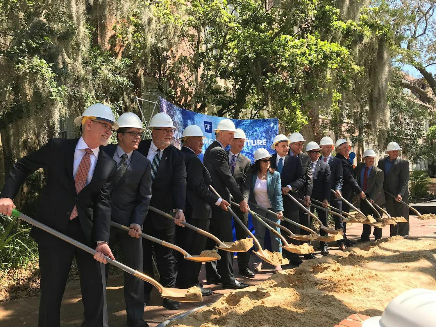 Leaders of the Norman Hall Rehabilitation project participate in a ceremonial groundbreaking&nbsp;Friday&nbsp;at the Norman Hall Plaza.&nbsp;