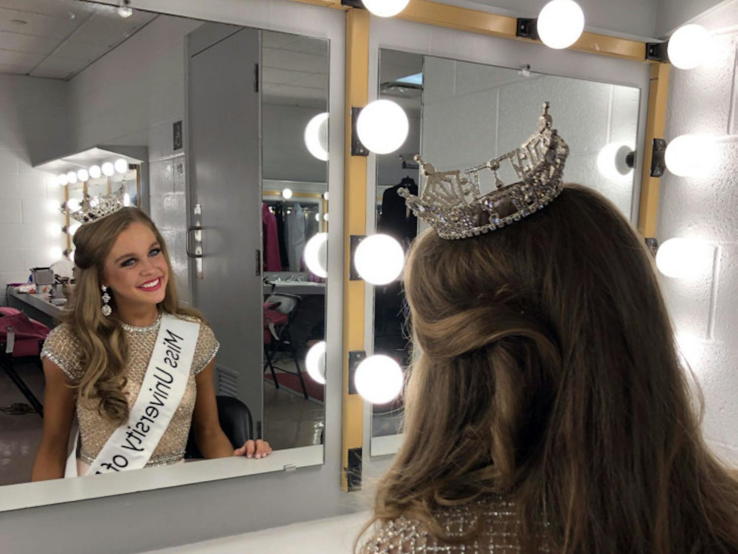 Leah Roddenberry decked out in her Miss UF crown and sash backstage.&nbsp;