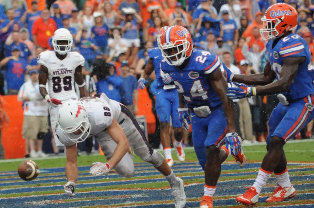 UF cornerback Brian Poole (24) reacts after deflecting a pass intended for Florida Atlantic receiver Jenson Stoshak to seal Florida's 20-14 overtime win against FAU on Nov. 21, 2015, at Ben Hill Griffin Stadium.