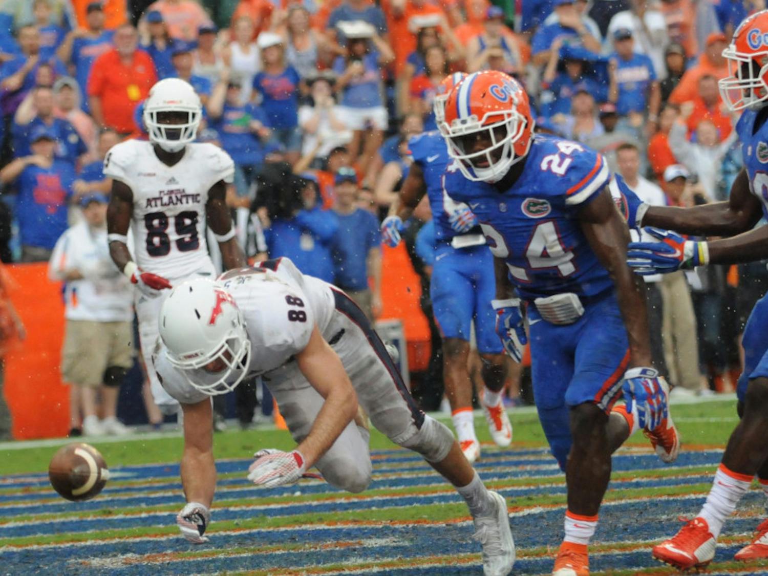UF cornerback Brian Poole (24) reacts after deflecting a pass intended for Florida Atlantic receiver Jenson Stoshak to seal Florida's 20-14 overtime win against FAU on Nov. 21, 2015, at Ben Hill Griffin Stadium.