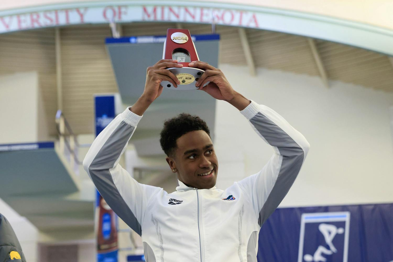 Florida freshman swimmer Joshua Liendo holds an award during the Men's NCAA Championships that took place from Wednesday, March 22, 2023 to Saturday, March 25, 2023.