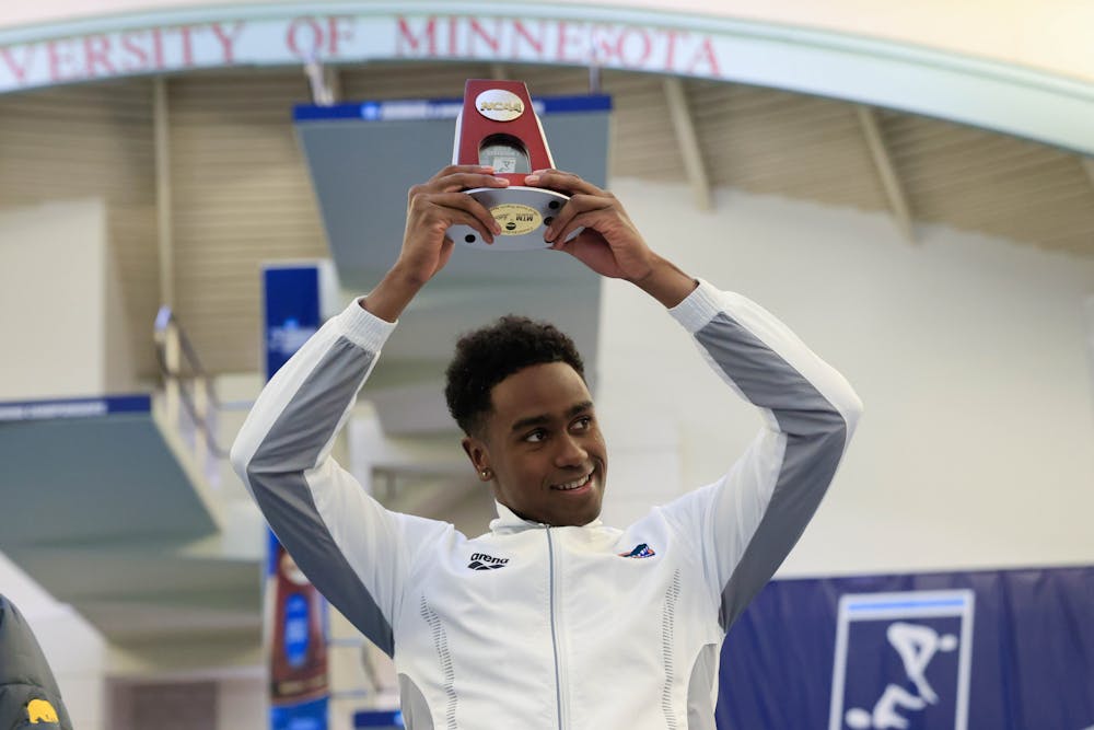 Florida freshman swimmer Joshua Liendo holds an award during the Men's NCAA Championships that took place from Wednesday, March 22, 2023 to Saturday, March 25, 2023.