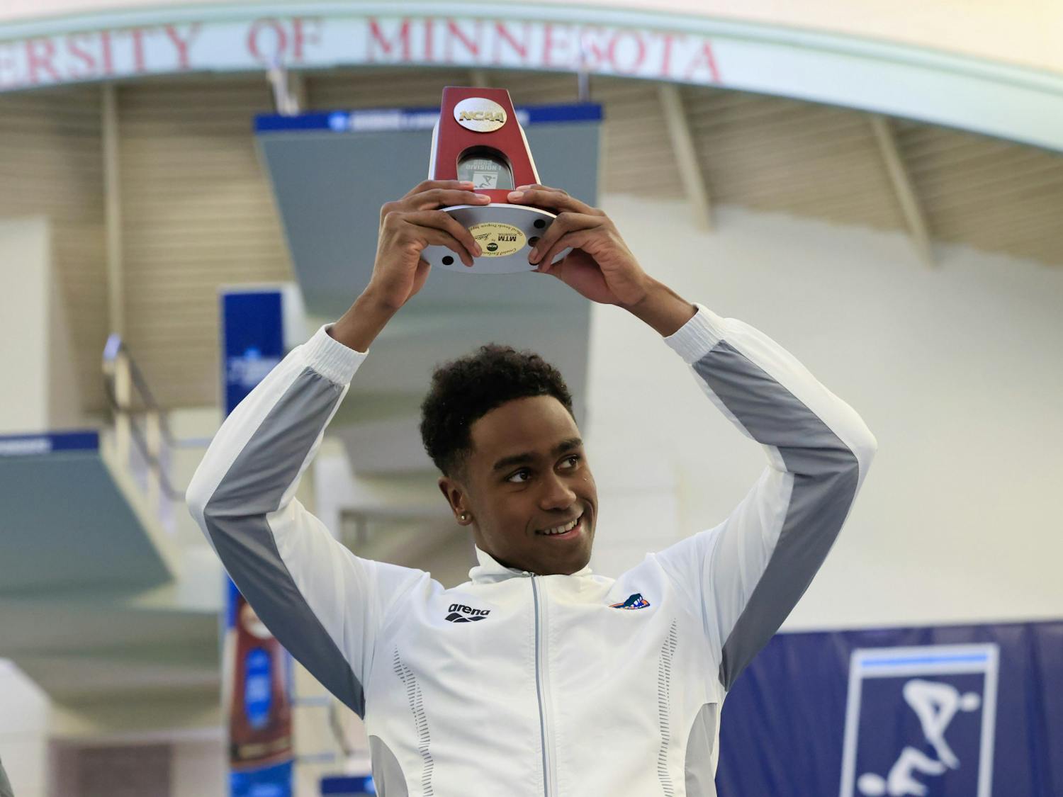 Florida freshman swimmer Joshua Liendo holds an award during the Men's NCAA Championships that took place from Wednesday, March 22, 2023 to Saturday, March 25, 2023.