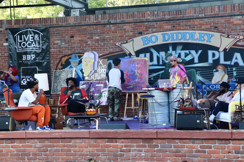 <p>“Dia Days” musical production inspired by the music-making process featured record label Dion Dia’s signed artists as the playwrights Thursday, March 17 at Bo Diddley Plaza. (photo by Dazion Prosser)</p>