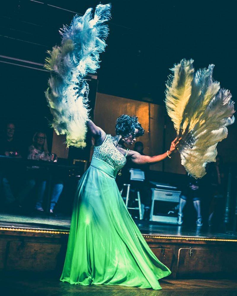A performer dances at Market Street Pub and Cabaret, which closed last month. Despite no longer having a stable venue, burlesque performers who once frequented Market Street will continue to put on shows around town, adapting to new venues and management.
