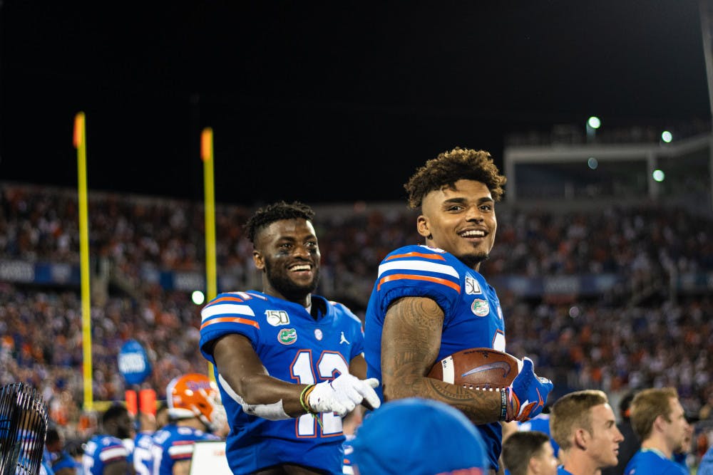 UF receiver Trevon Grimes (right) on quarterback Feleipe Franks' celebrations: "People don’t understand, he goes through so much stuff. He goes through so much criticism."