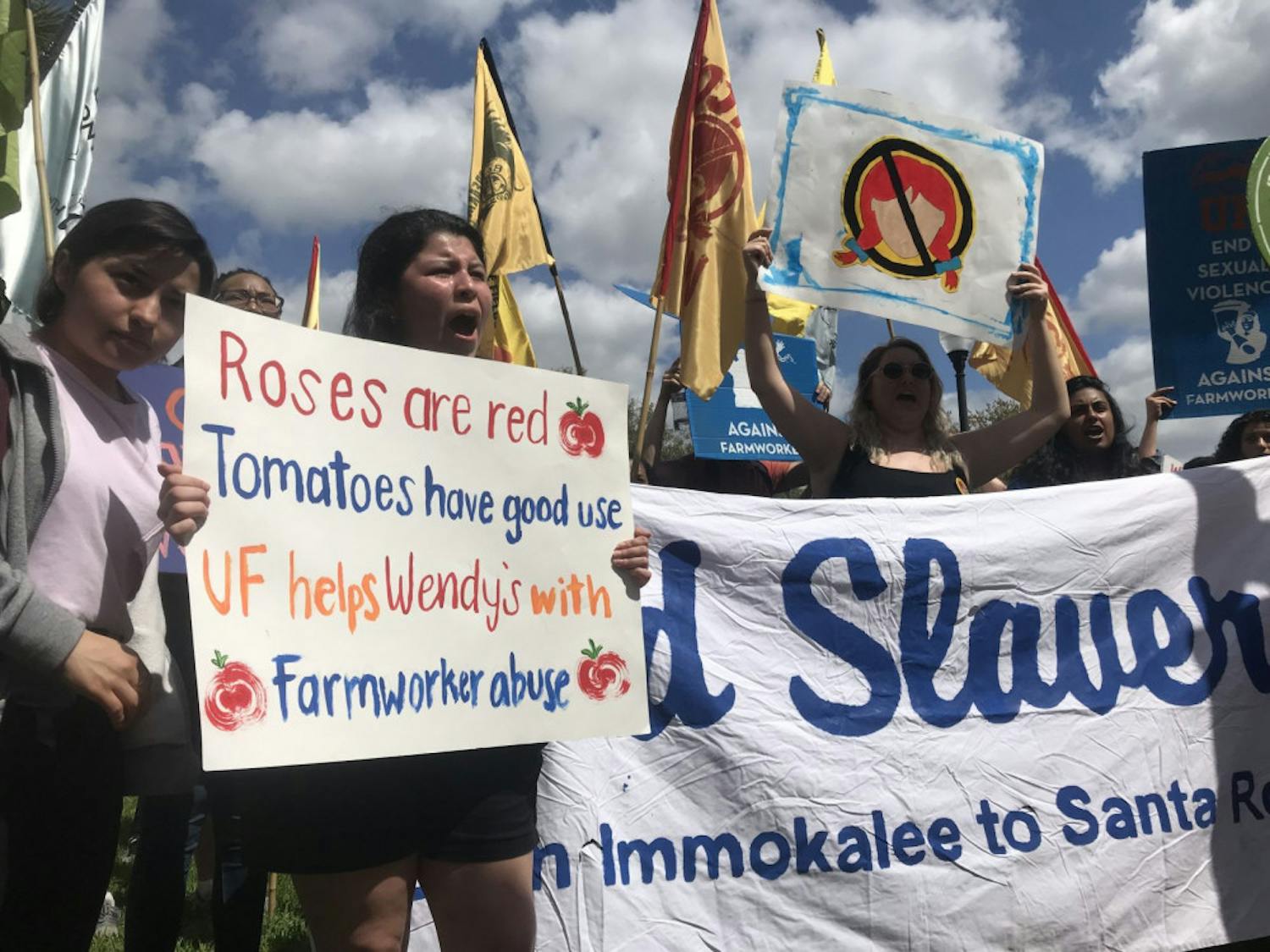 Students, organizers and Immokalee workers marched through campus from Norman Field to Tigert Hall Thursday to urge UF to remove the Wendy’s from campus.