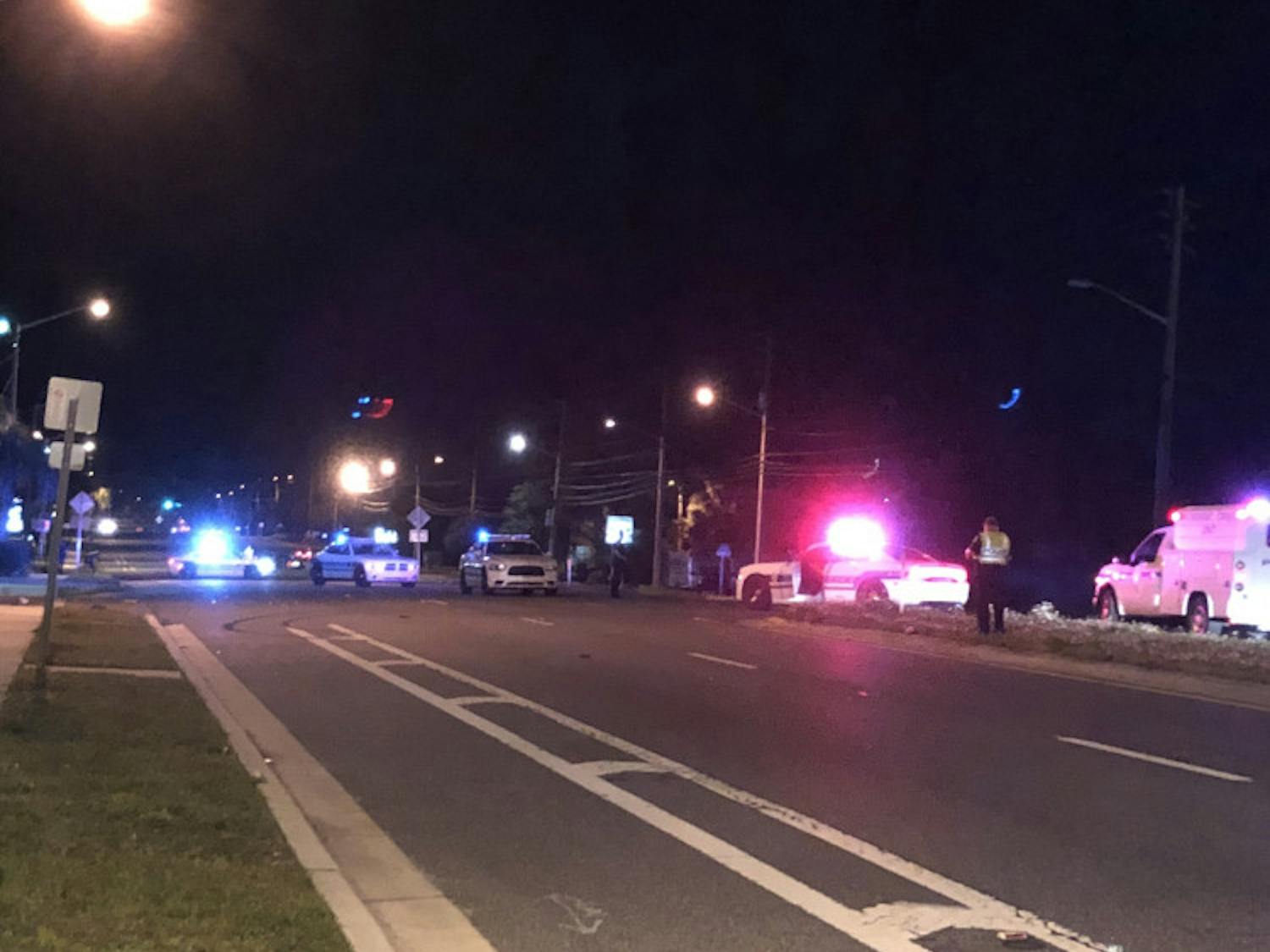 A woman died at UF Health Shands after she was hit by a car while crossing Southwest 13th Street, according to Gainesville Police.  