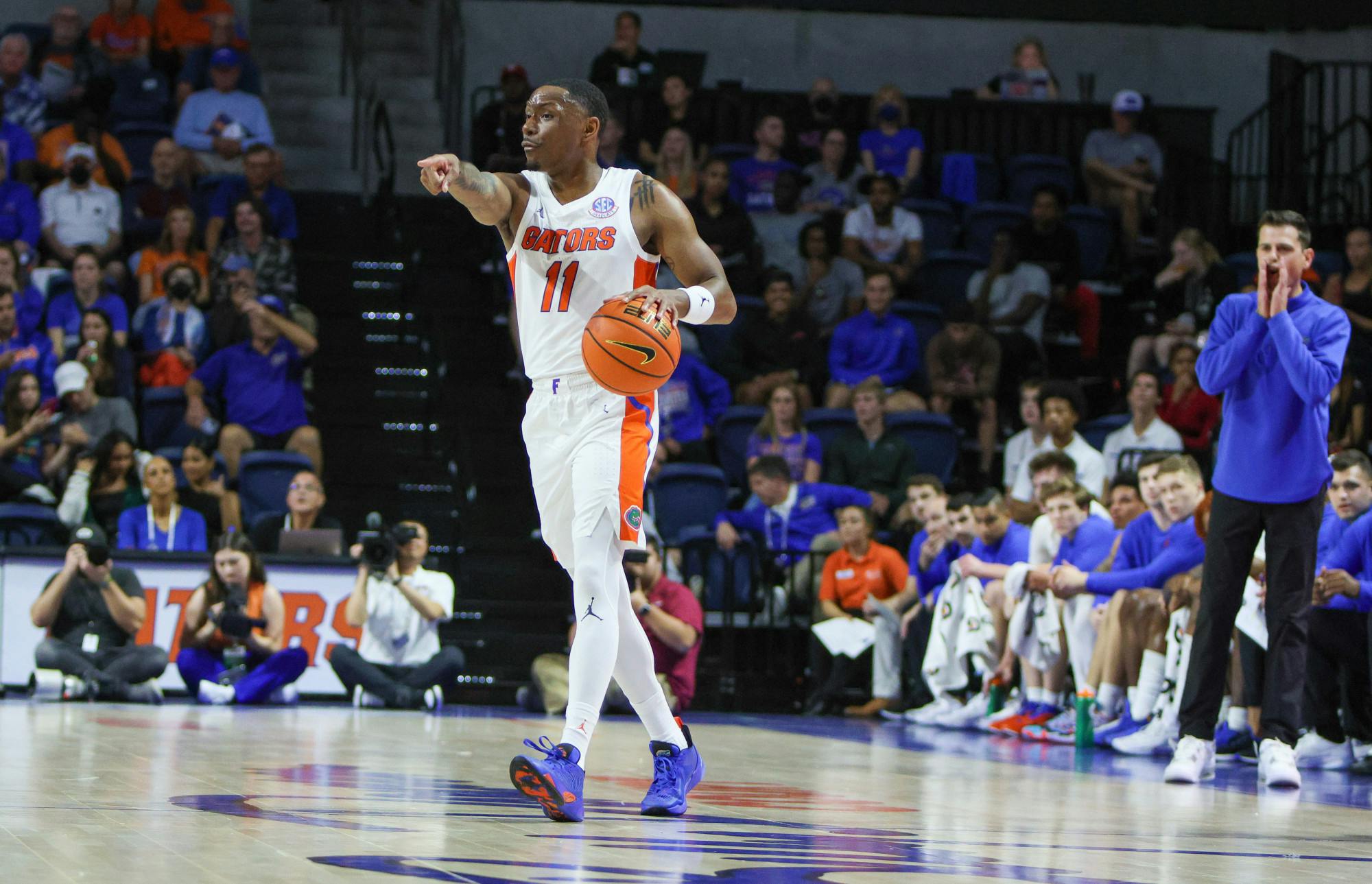 Graduate student guard Kyle Lofton directs the offense in Florida&#x27;s 81-45 victory over Stony Brook Monday, Nov. 7, 2022.