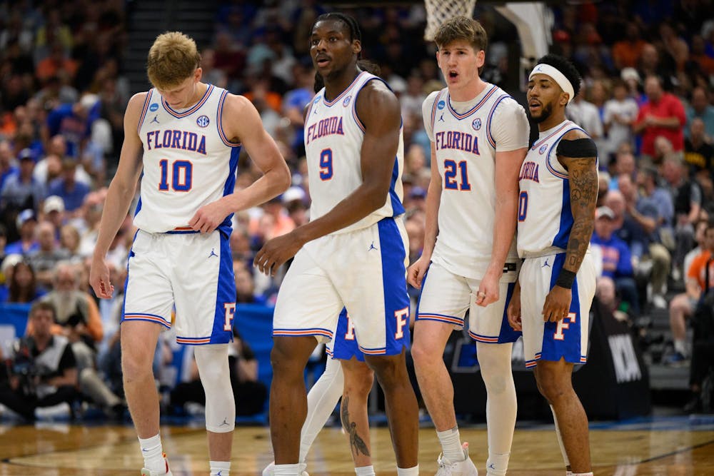 <p>Florida stands on the court during the first half of an NCAA Tournament second round game against Iowa, Sunday, March 22, 2026, in Tampa, Fla.</p>