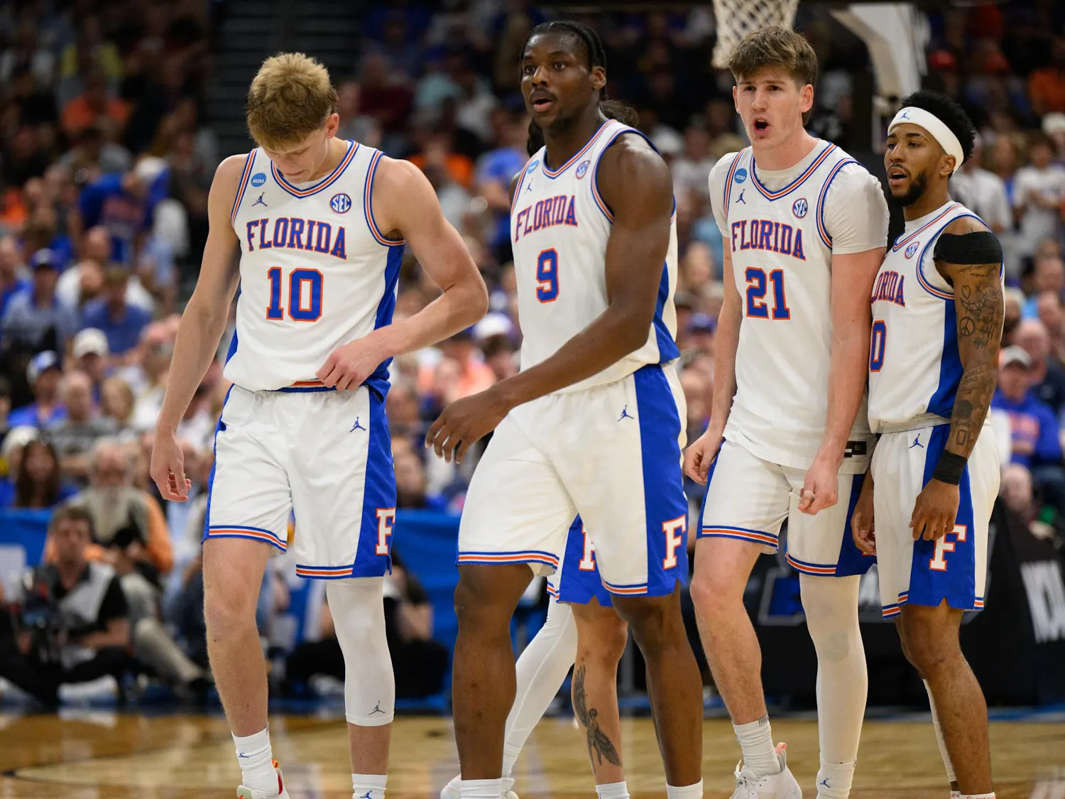 Florida stands on the court during the first half of an NCAA Tournament second round game against Iowa, Sunday, March 22, 2026, in Tampa, Fla.