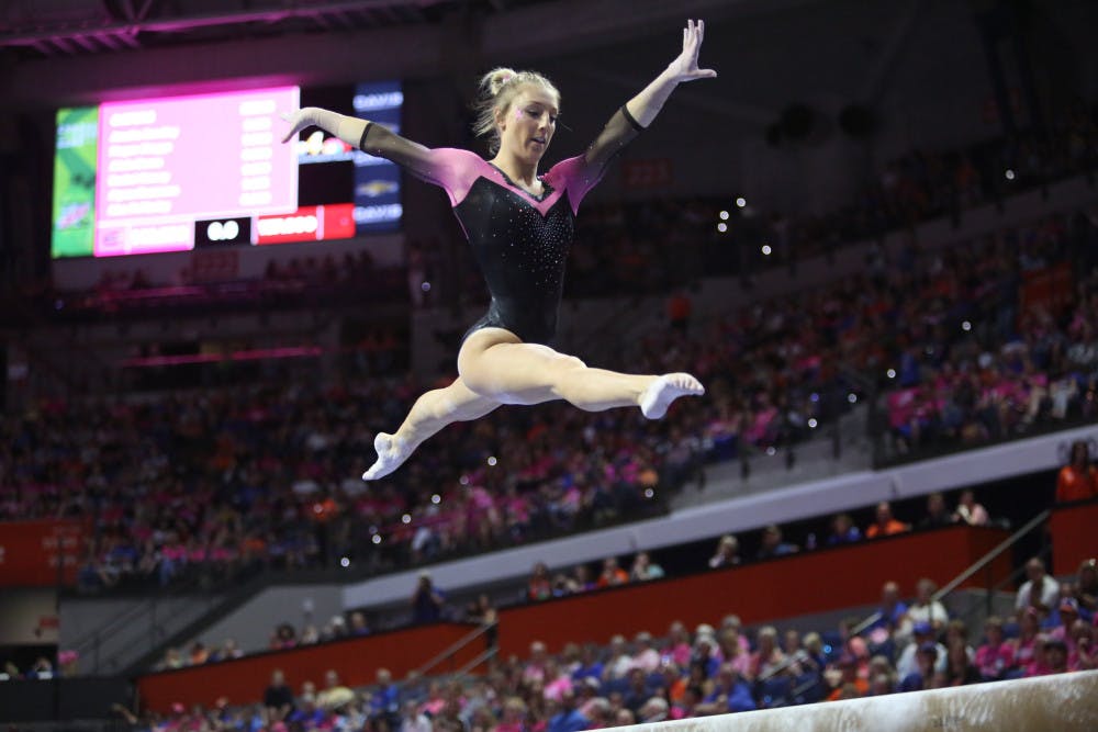 Senior Alex McMurtry won the individual title in beam (9.950), bars (9.950) and vault (9.925) Friday night against Missouri. 