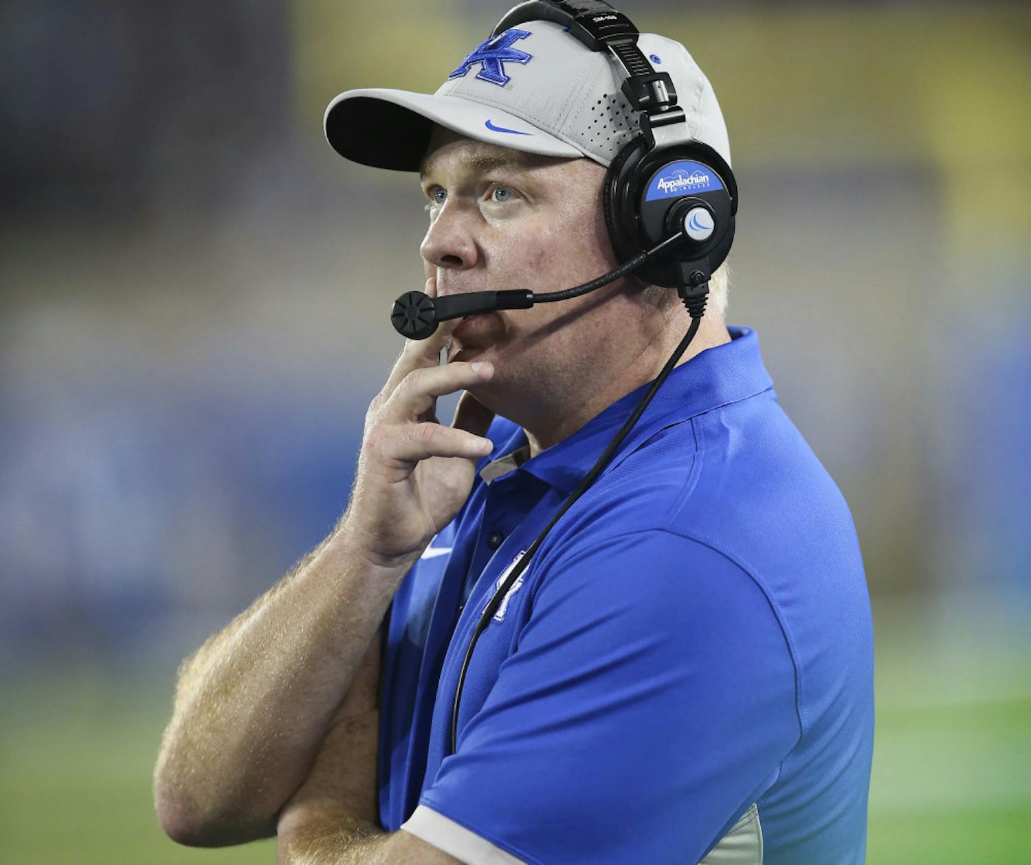 FILE - In this Sept. 5, 2015, file photo, Kentucky coach Mark Stoops watches his team from the sideline during an NCAA college football game against Louisiana-Lafayette in Lexington, Ky. Stoops made an early splash in recruiting and went from two victories in year one in Lexington to five in year two. Then another second-half swoon last year made it three straight bowl-less seasons for the Wildcats. Four in a row is not acceptable in the SEC, even for a program with relatively modest expectations. (AP Photo/David Stephenson, File)