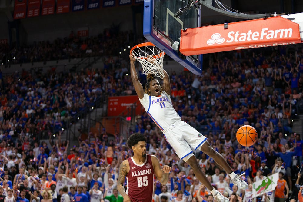 Florida sophomore guard Denzel Aberdeen celebrates after slamming a dunk against the Alabama Crimson Tide in the Gators’ 105-87 win on Tuesday, March 5, 2024. 