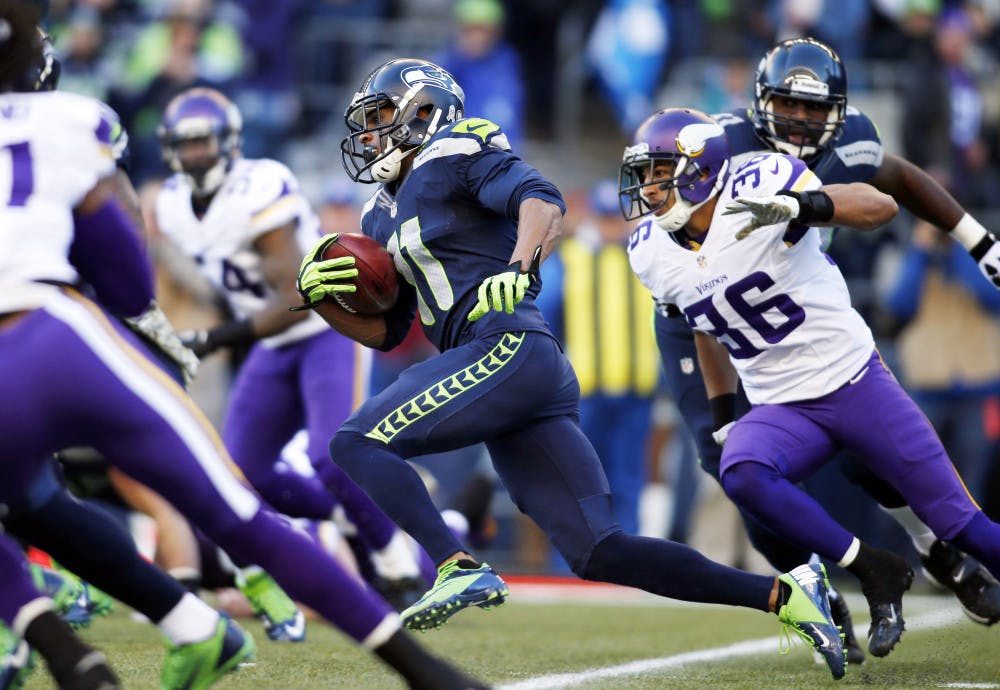 <p>Seattle Seahawks' Percy Harvin (11) returns the ball against the Minnesota Vikings on a kickoff in the first half of his team's 41-20 win Sunday in Seattle.</p>