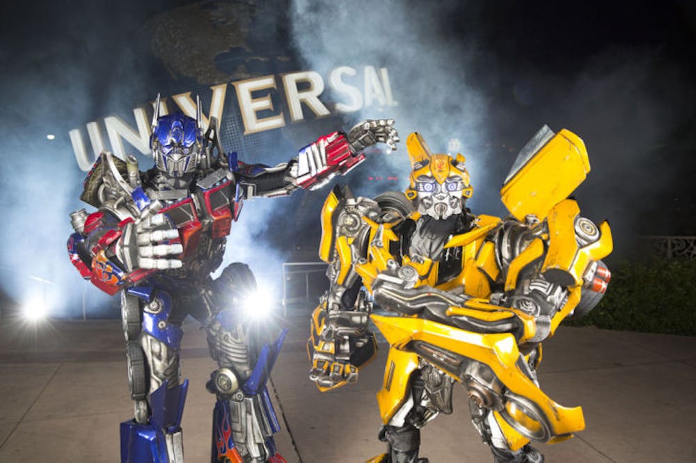 <p>Optimus Prime and Bumblebee are the newest movie stars to snag their own ride at Universal Studios Orlando. Transformers: The Ride-3D will open this summer. Read the story on page 8.</p>