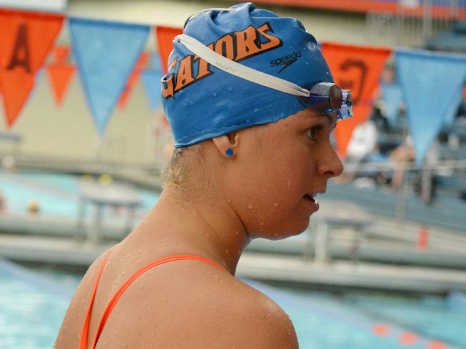 UF junior Elizabeth Beisel speaks to her teammates at the All Florida Invitational at the O'Connell Center in 2012.
