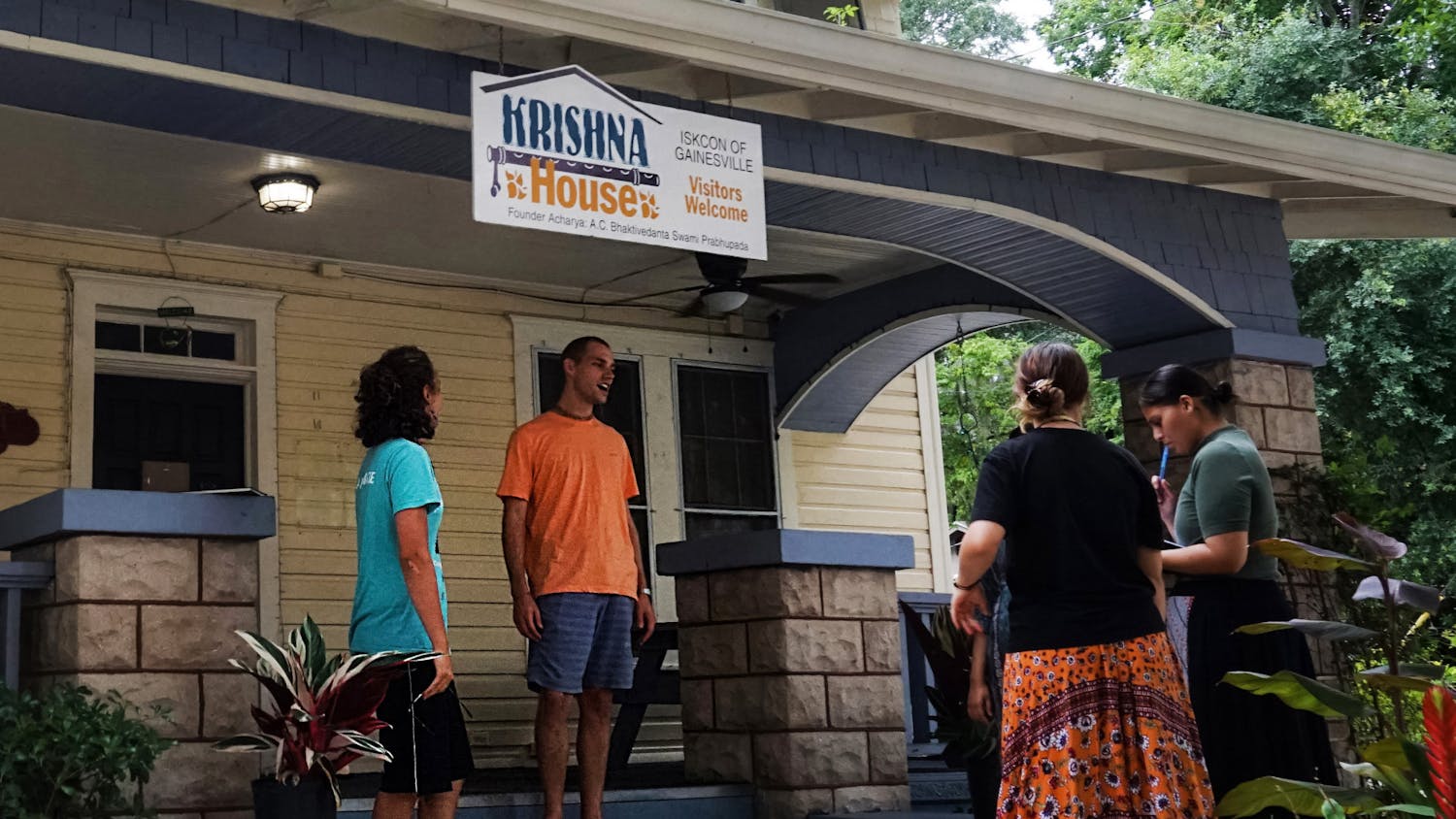 A group of Hare Krishnas gathered outside the Krishna House at 214 NW 14th Street in Gainesville on Thursday, July 29, 2021. The Gainesville community is celebrating the 50th anniversary of Krishna Lunch at UF this weekend. 