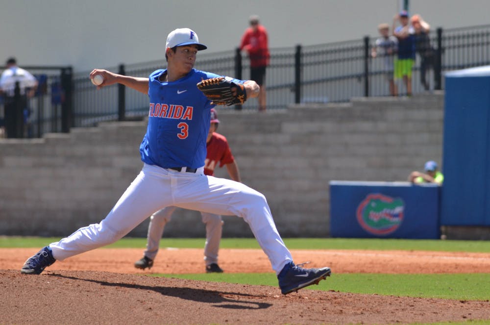 <p>UF's Dane Dunning pitches during Florida's 7-4 win against Alabama on March 28, 2015, at McKethan Stadium.</p>