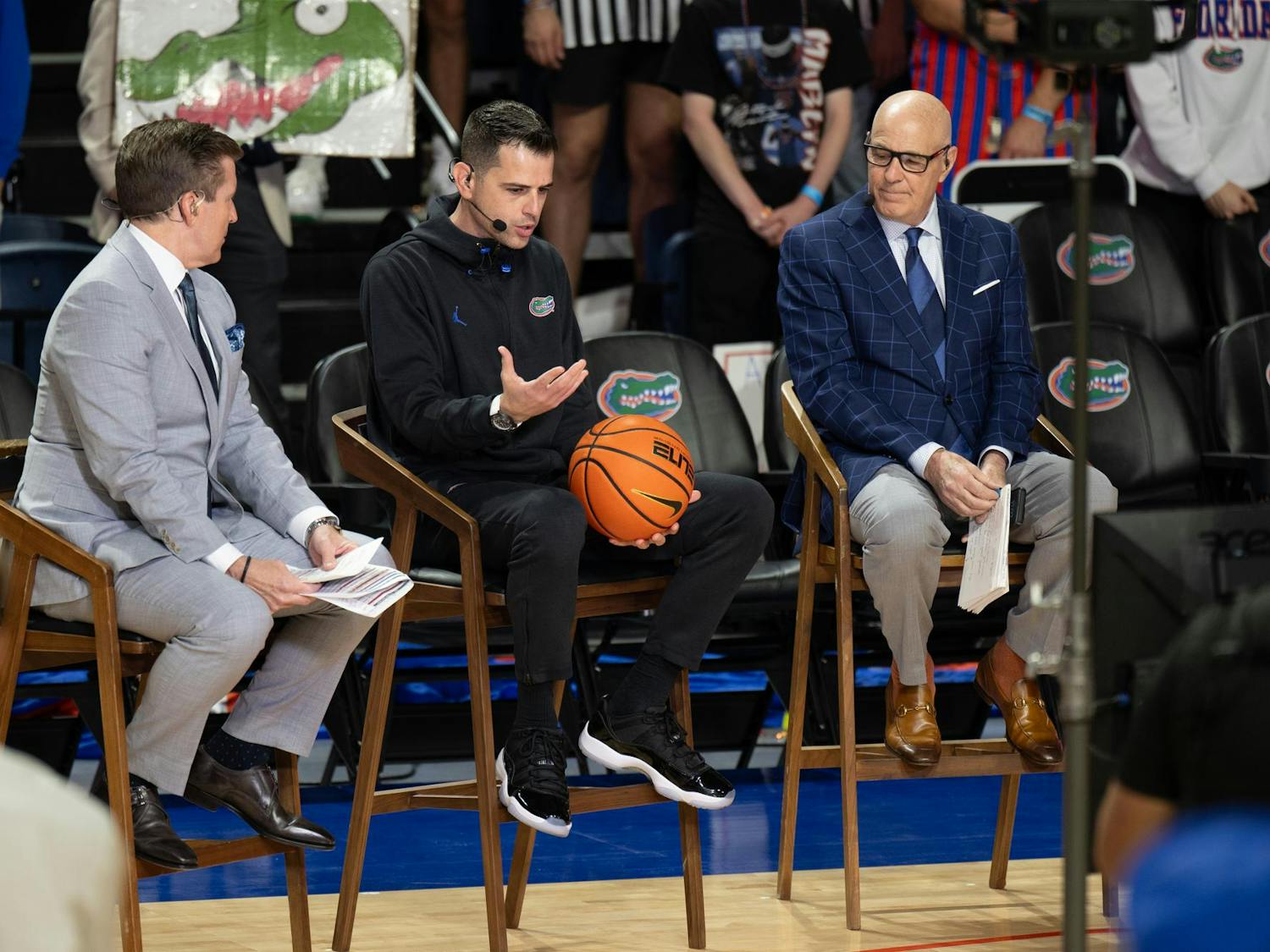 Florida Gators Head Coach Todd Golden joins ESPN College GameDay hosts Rece Davis and Seth Greenberg on the floor of the Steven O’Connell Center during the show on Saturday, Mar. 1, 2025, in Gainesville, Fla.
