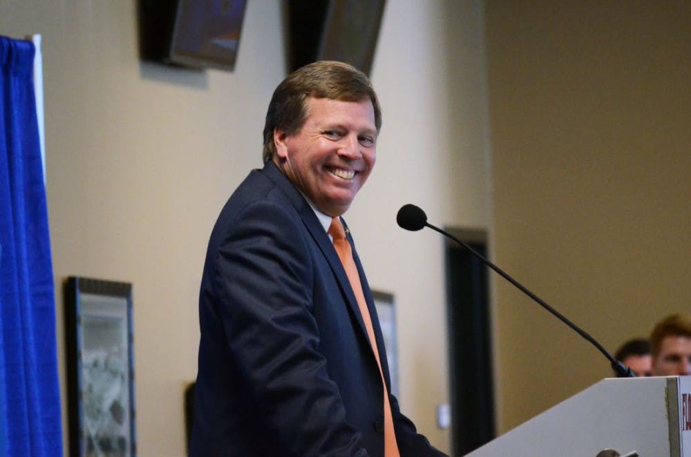 <p>New head football coach Jim McElwain speaks at his introductory press conference in Ben Hill Griffin Stadium.</p>