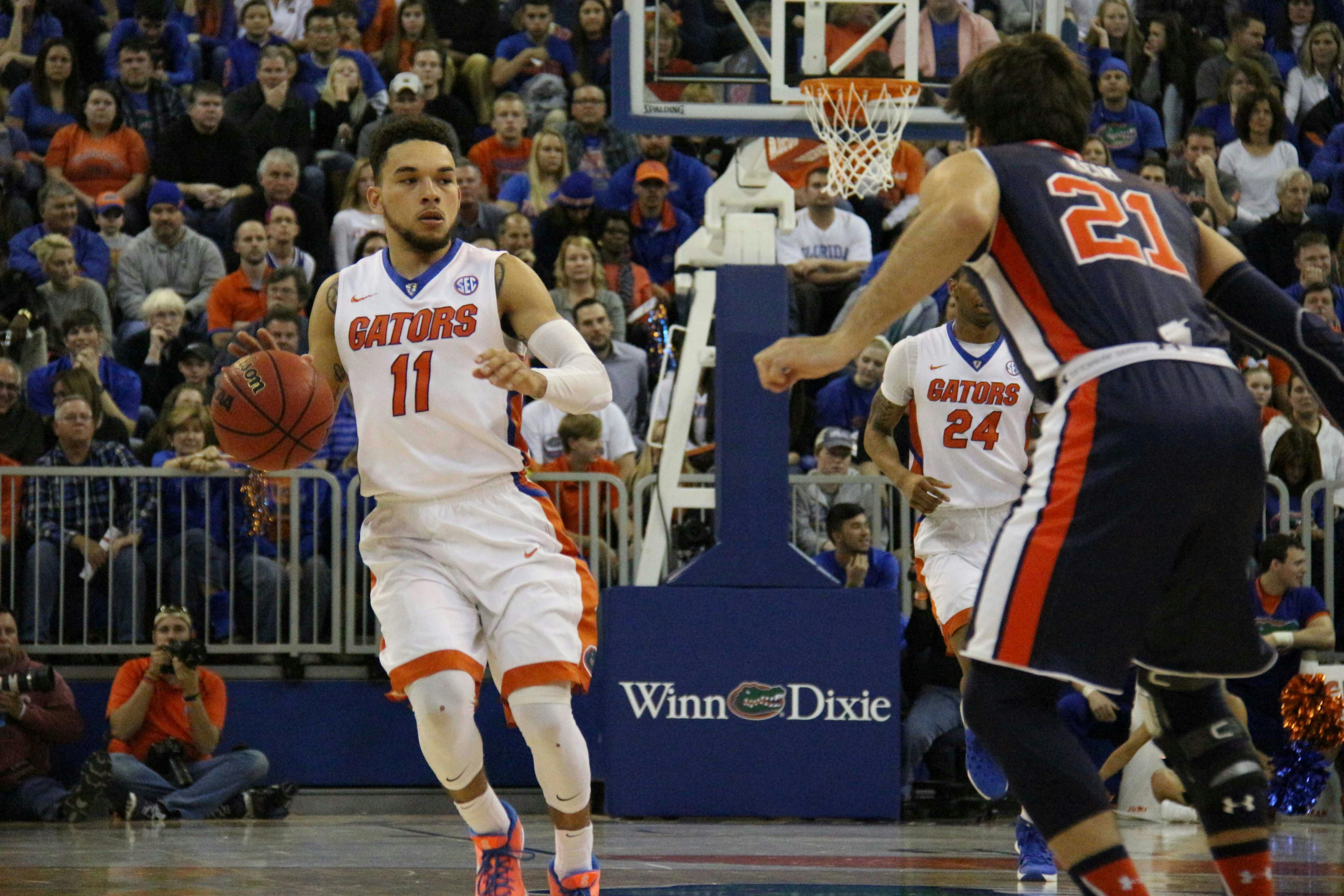 UF’s Chris Chiozza drives down the court during Florida’s 95-63 win against Auburn on Jan. 23, 2016, in the O’Connell Center.
