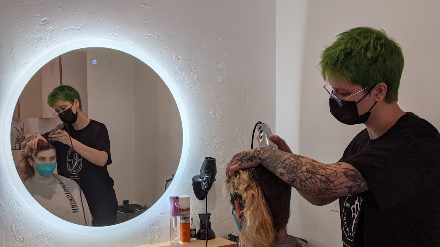 Jamie Devine-Spears gets their haircut at Goldenrod Parlor, an LGBTQ friendly hair salon Sunday, June 12, 2022.