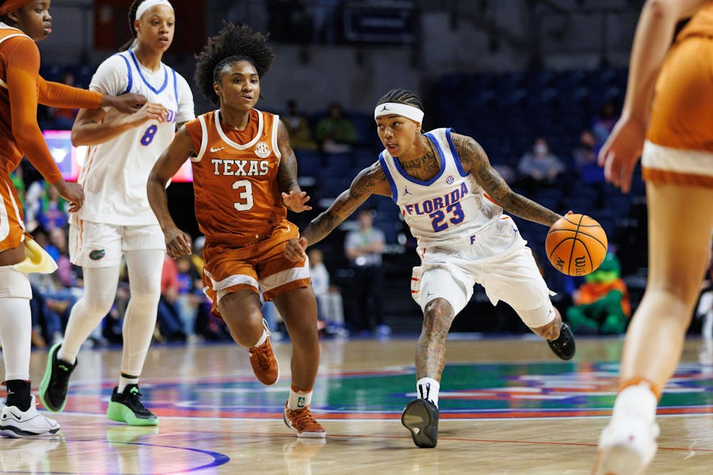 Florida guard Liv McGill (23) dribbles the ball during the second half of an NCAA basketball game against Texas, Thursday, Jan. 29, 2026, in Gainesville, Fla.