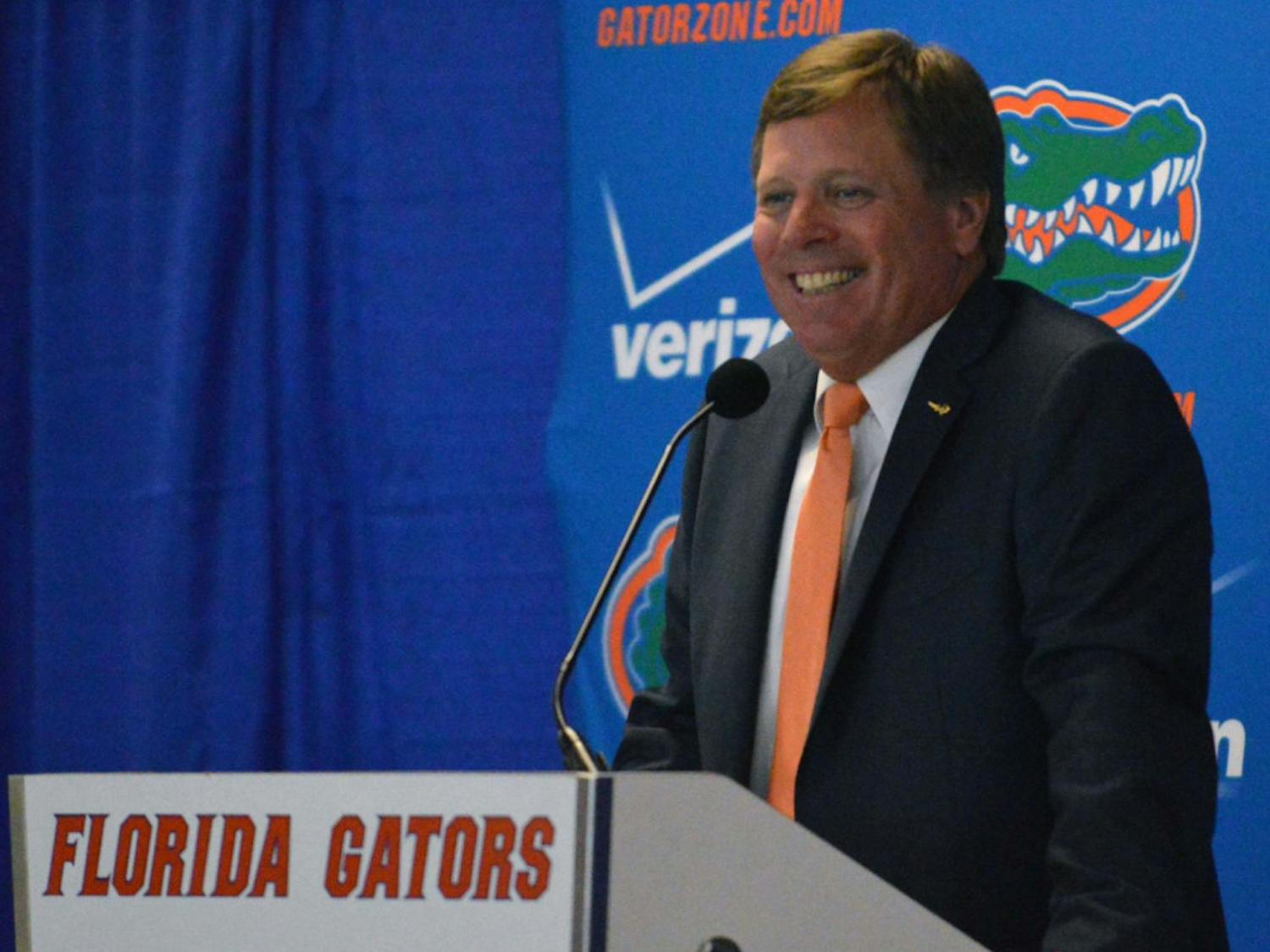 New head football coach Jim McElwain following his introductory press conference on Saturday at Ben Hill Griffin Stadium.