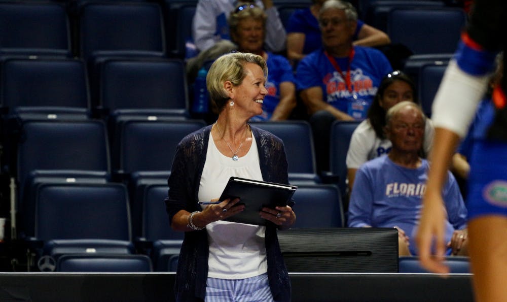 <p>UF coach Mary Wise smiles during Florida's 3-0 win against Florida A&amp;M on Sept. 15, 2017, in the O'Connell Center.</p>