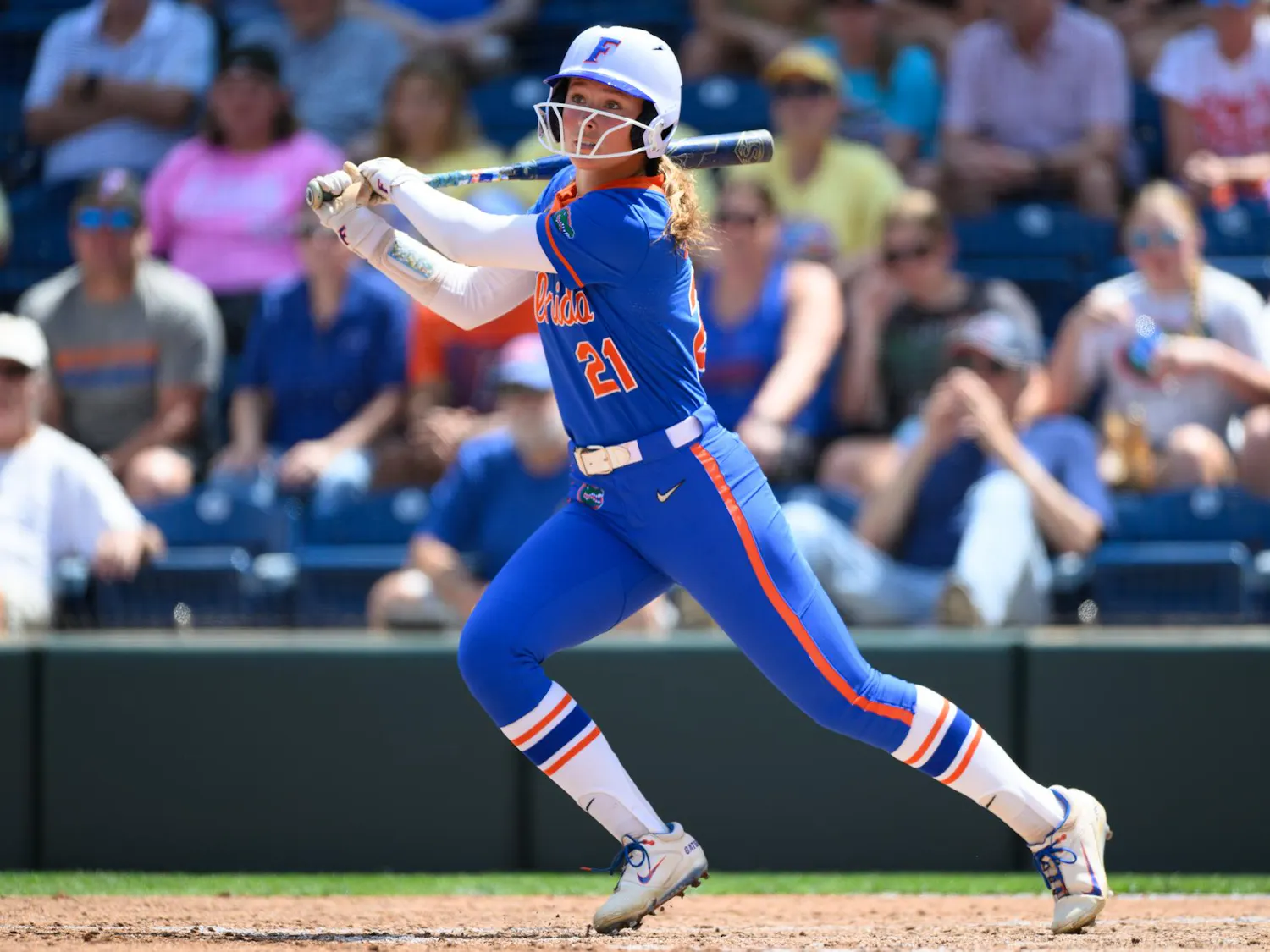 Florida outfielder Taylor Shumaker (21) hits during an NCAA softball game against Mississippi State, Saturday, April 4, 2026, in Gainesville, Fla.