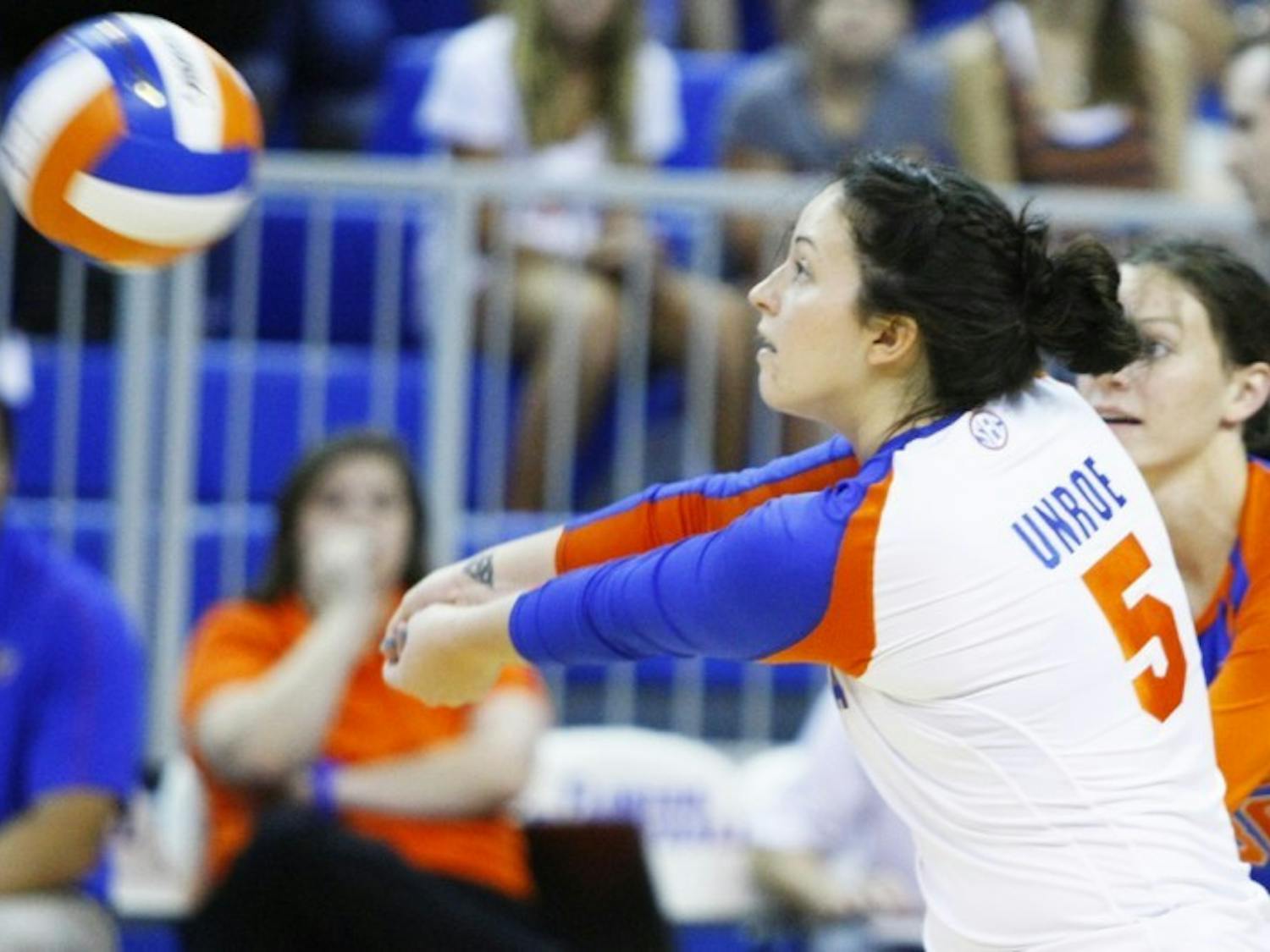 Sophomore Taylor Unroe (5) returns the ball against Florida Atlantic at the Stephen C. O'Connell Center on Aug. 24.