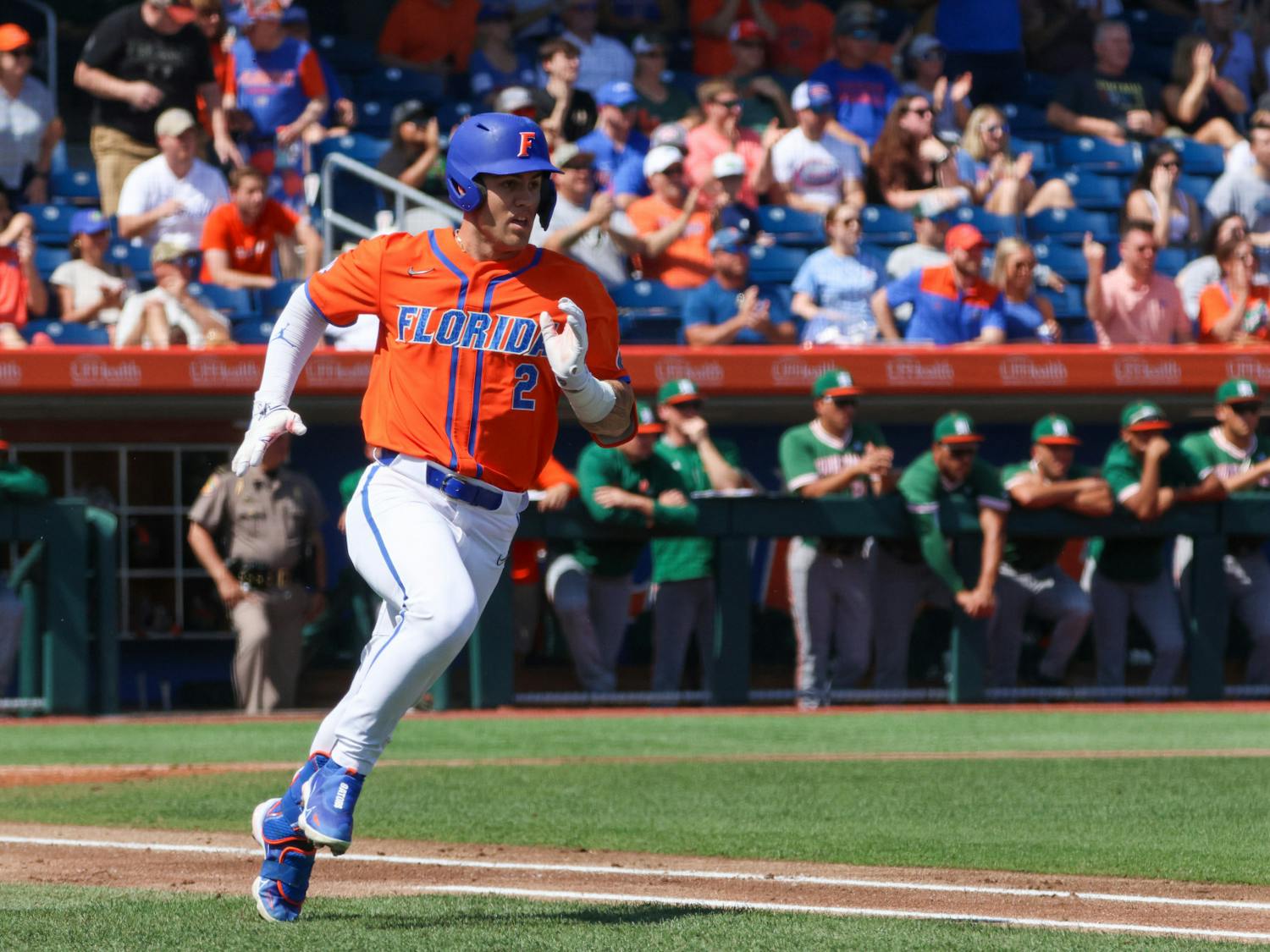 Florida right fielder Ty Evans runs toward first base in the Gators' 14-4 win against the Miami Hurricanes Sunday, March 5, 2023.