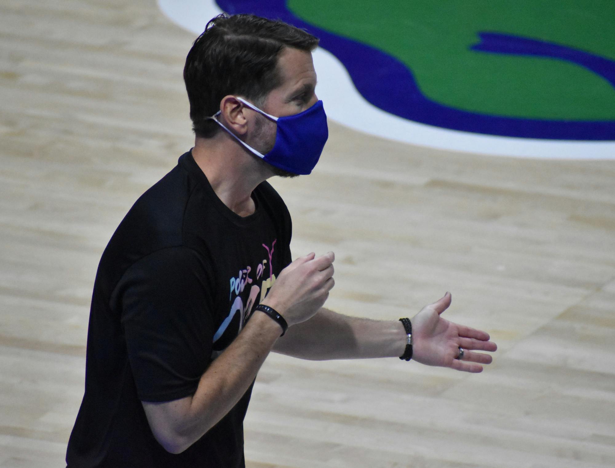 Cameron Newbauer coaching against Kentucky on Feb. 15. Newbauer announced he is stepping down as head coach of the Gators Friday.