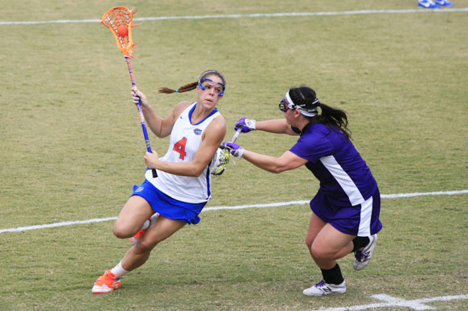 Senior attacker Kitty Cullen looks to score against UAlbany on Feb. 24 at Donald R. Dizney Stadium. Cullen scored two goals in her final game for the Gators.