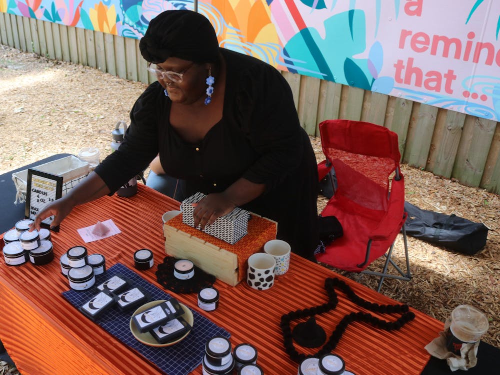 Salem Commander brought her homemade candles to 4th Ave Foodpark's Juneteenth celebration on June 19, 2021. Commander makes the candles herself and sells them at local markets.