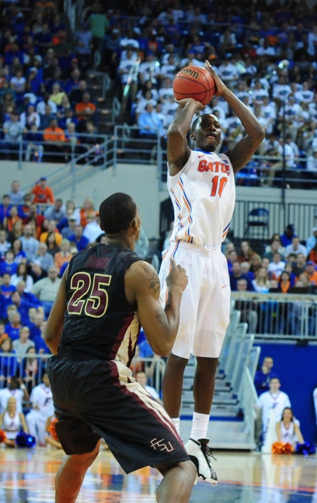 Redshirt sophomore forward Dorian Finney-Smith shoots a jumper during No. 15 Florida's 67-66 win against Florida State on Friday night in the O'Connell Center.