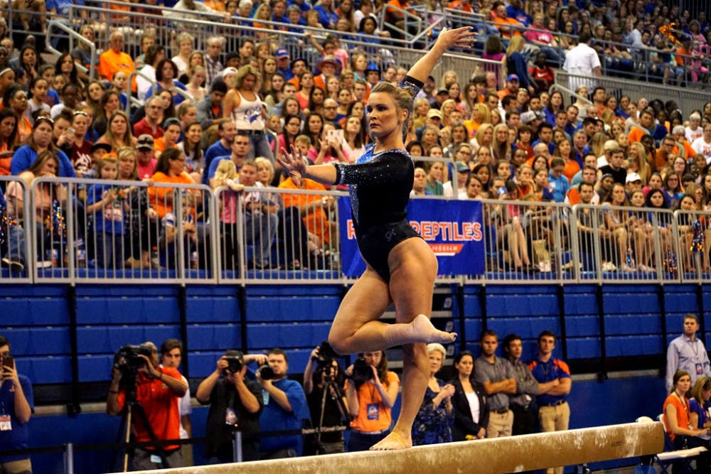 Bridget Sloan performs on beam during Florida's&nbsp;198.050-193.725 win over North Carolina on March 11, 2016, in the O'Connell Center.&nbsp;