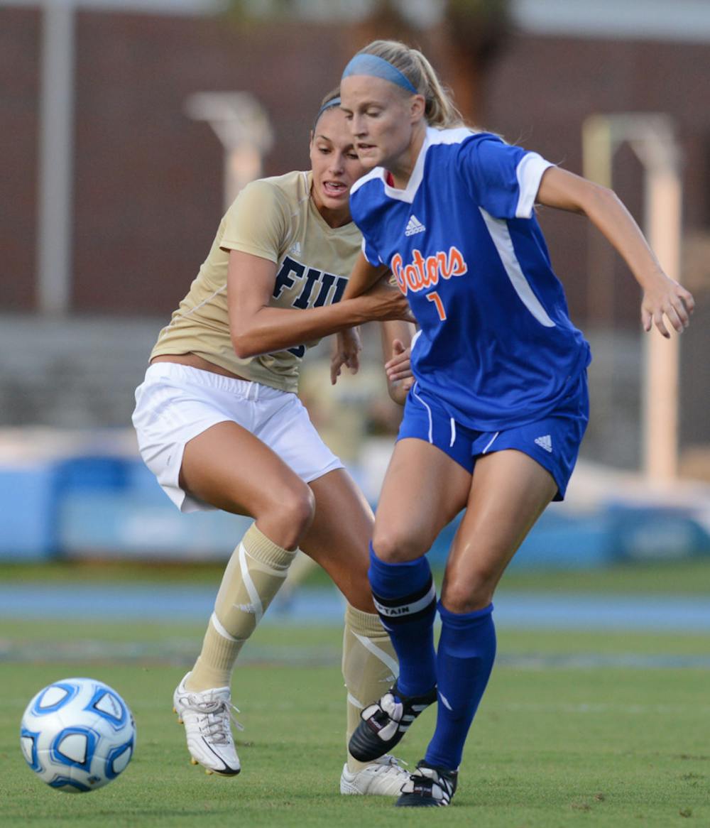 <p><span>Florida center back Kat Williamson fights for the ball against FIU on Sept. 7. Williamson suffered a torn right meniscus during the game.</span></p>
<div><span><br /></span></div>