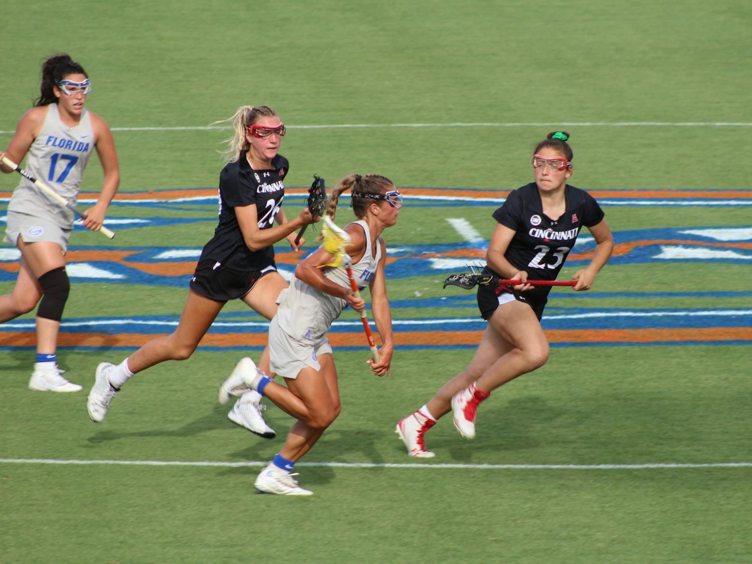 Emily Heller races down the field for Florida against Cincinnati on May 6.